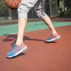 Low angle of person playing basketball