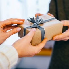 People exchanging a gift card